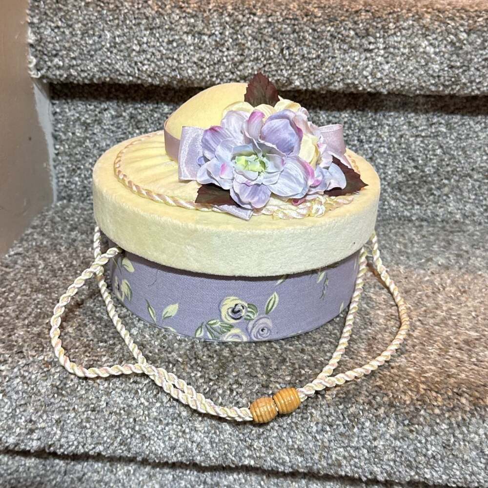The Bearington Collection Ribbon And Roses Hat with matching duck inside